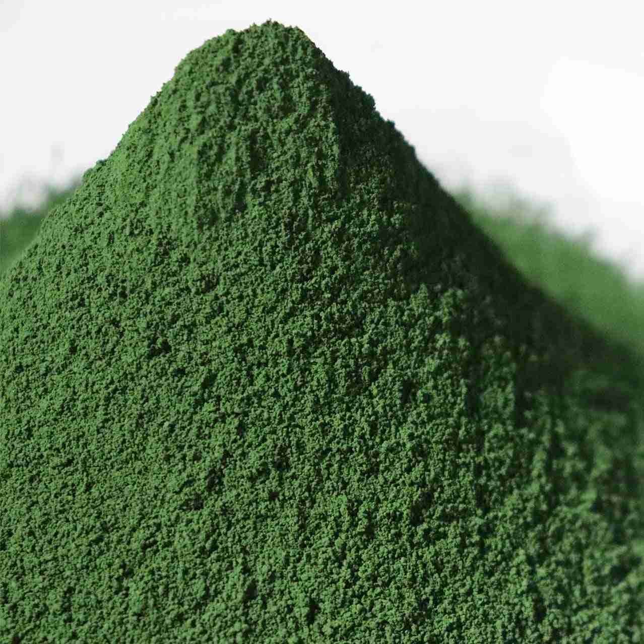 Chrome oxide green pigment powder — warm tone